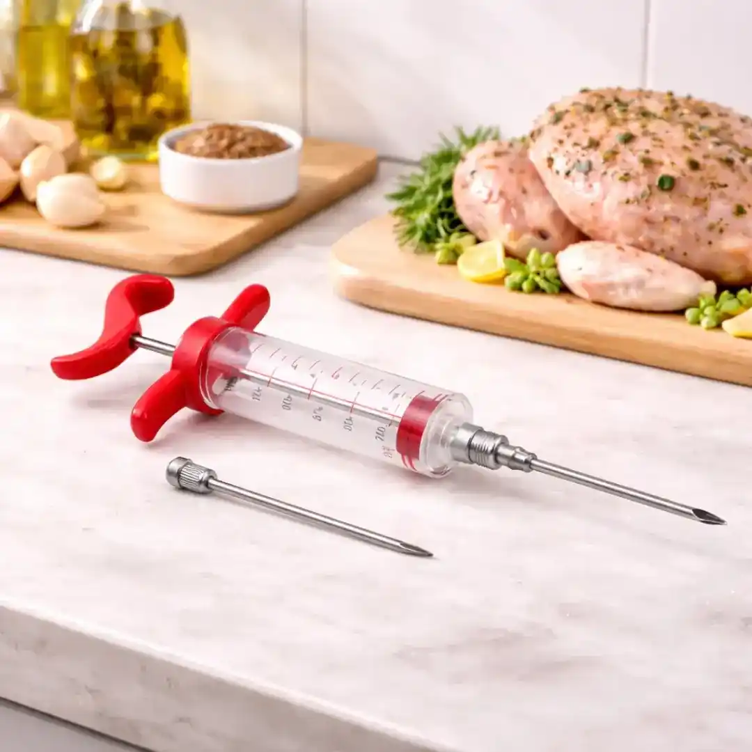 Red and clear plastic meat marinade injector syringe with detachable 7.8cm stainless steel needle showing product dimensions
