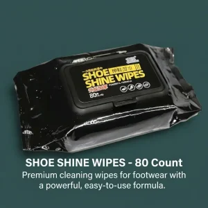 Black pack of 80-count disposable shoe shine cleaning wipes with a black flip-top lid resting on a dark teal background.