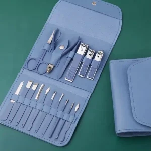 Open light blue faux leather travel pouch displaying a complete stainless steel manicure and pedicure grooming tool kit beside its closed case.