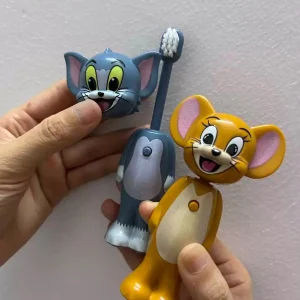 Tom and Jerry cartoon character kids toothbrushes in blue and yellow colors